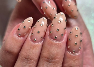 Elegant nail art with gems at Mooi Getooi in Douglas, Northern Cape, ZA.