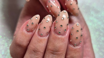 Elegant nail art with gems at Mooi Getooi in Douglas, Northern Cape, ZA.