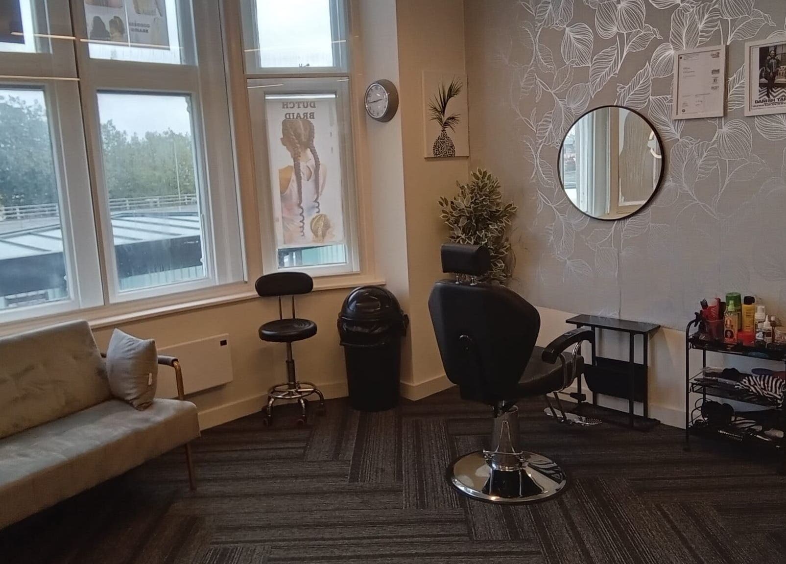 Chic interior of Lovenish Hair and Beauty Salon, Newport, Wales, GB with stylish seating and decor.