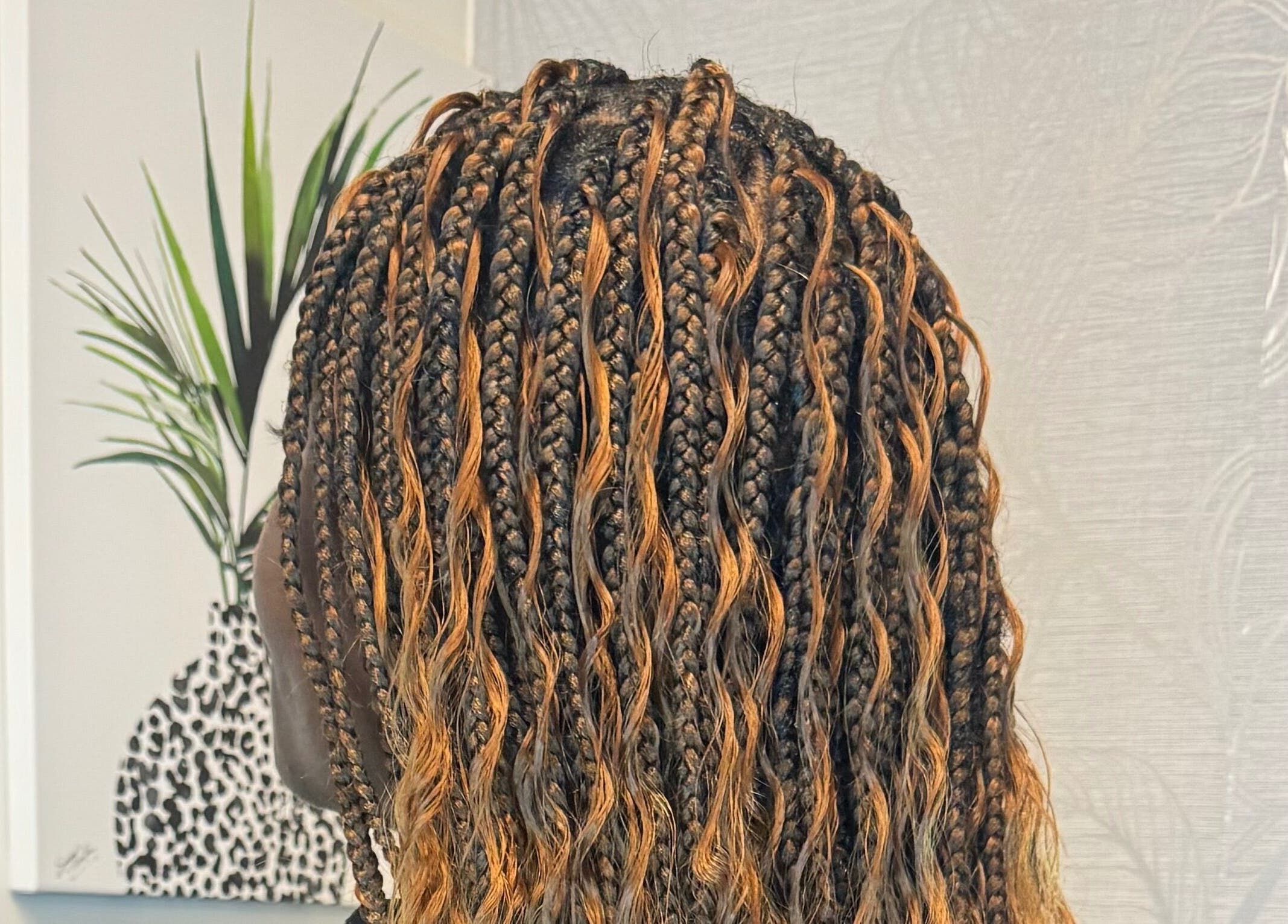 Stylish braided hairstyle at Lovenish Hair and Beauty Salon, Newport, Wales, GB.