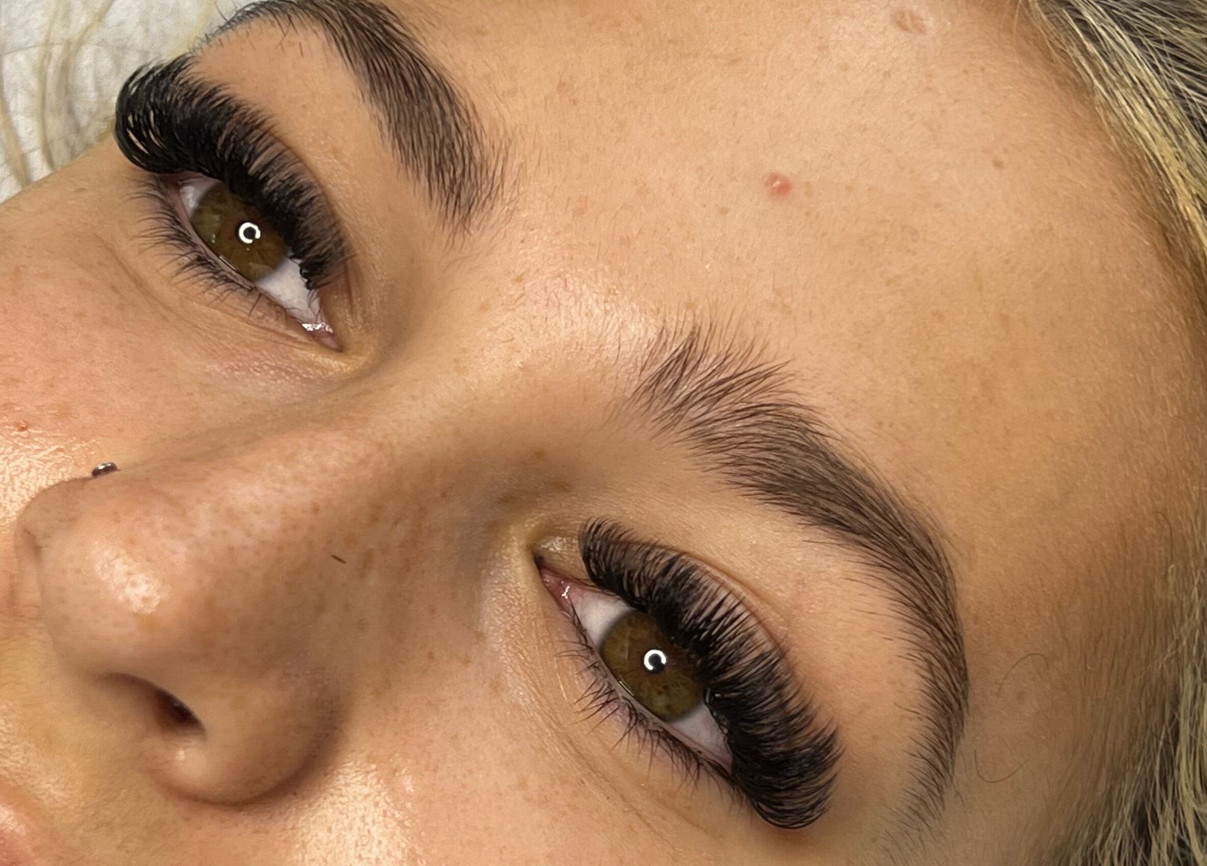 Close-up of eyelash extensions at Vienna Aesthetics, Reigate, England, GB showcasing delicate beauty.