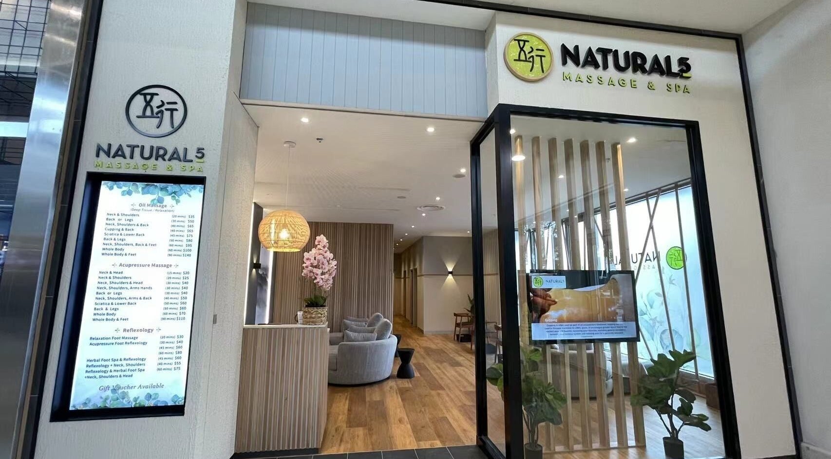 Entrance of Natural Five Massage & Spa in Melbourne, Victoria, AU, showcasing a stylish, tranquil atmosphere.