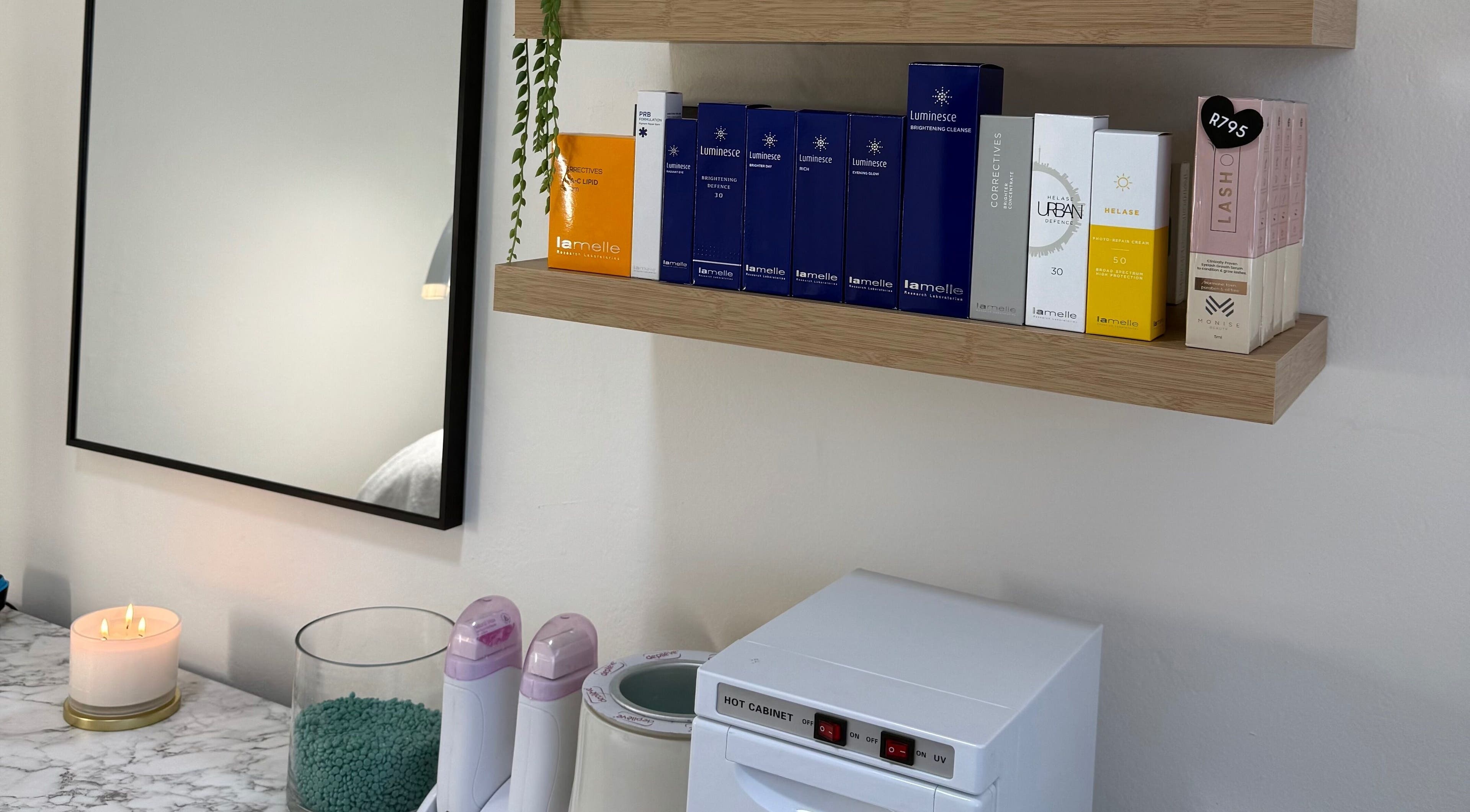 Beauty products on shelves at Studio XO La Lucia, Durban North, Kwazulu-natal, ZA, enhancing the spa's elegance.