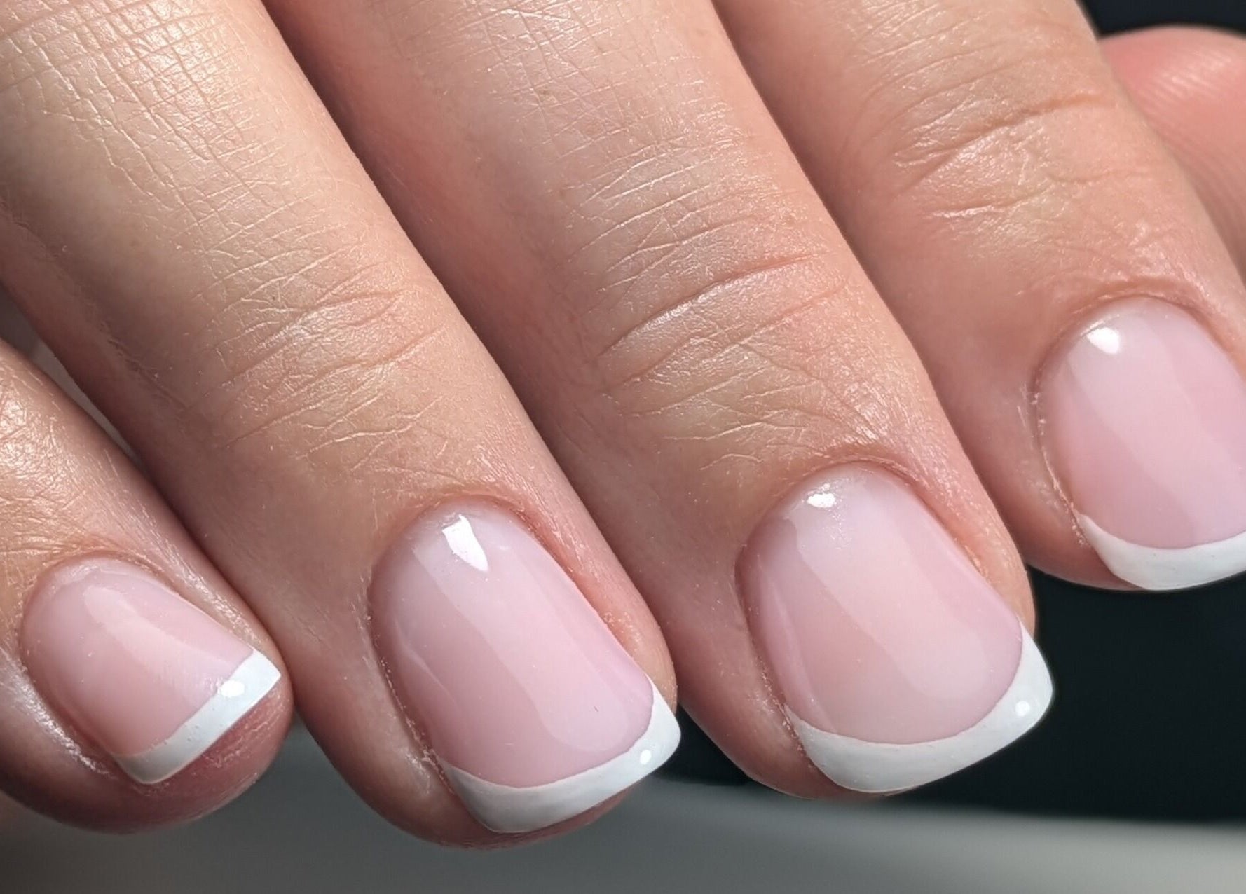 Chic French manicure at AS Nail Studio Peterborough, Peterborough, England, GB showcasing elegance and style.