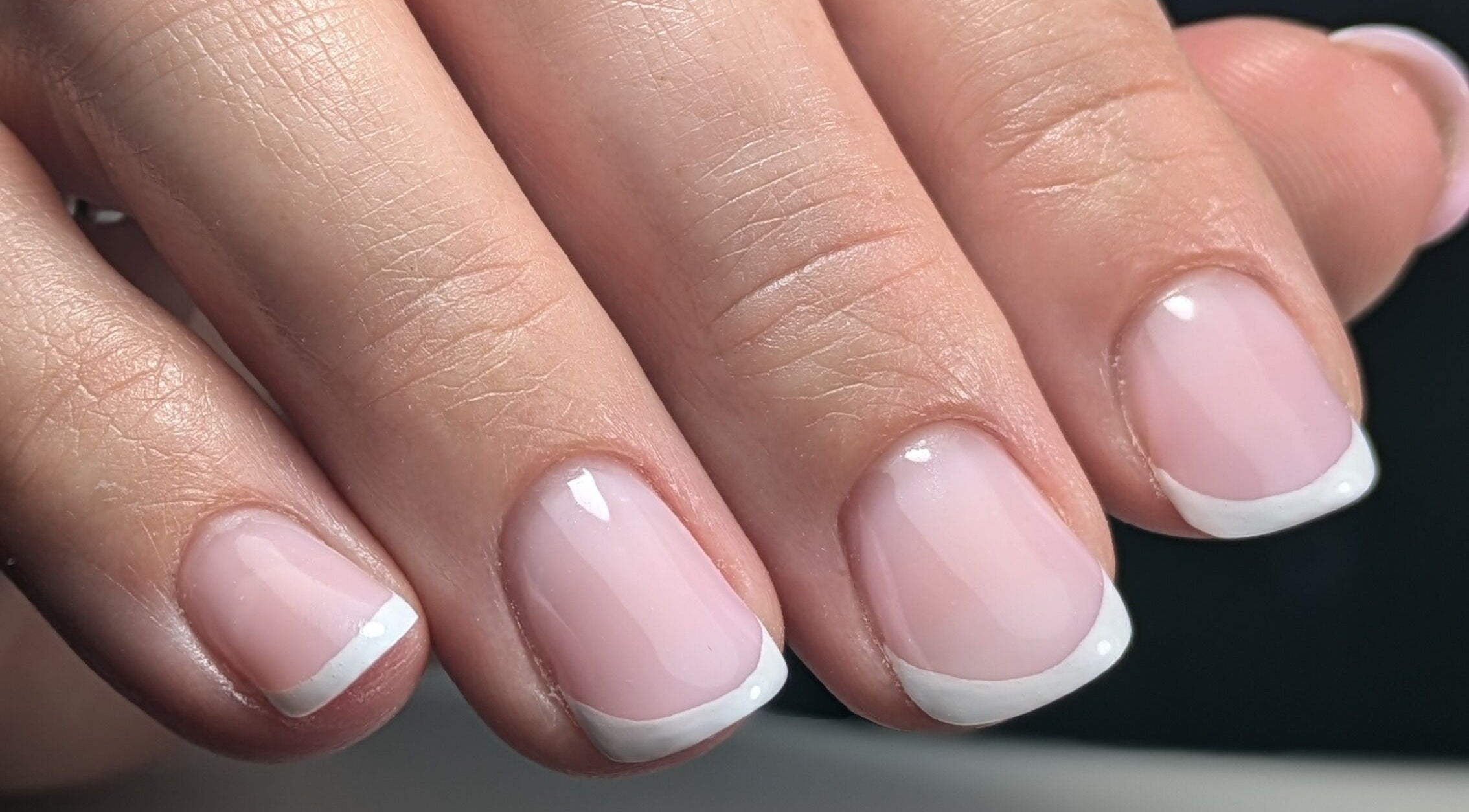 Chic French manicure at AS Nail Studio Peterborough, Peterborough, England, GB showcasing elegance and style.