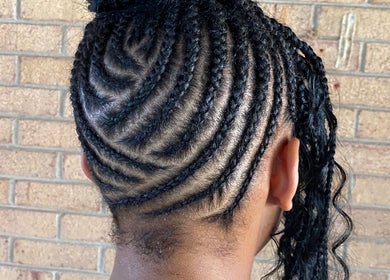 Artistic braided hairstyle at Platinum's Beauty Studio, Burlington, North Carolina, US.