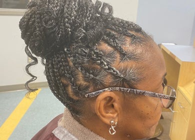 Close-up of elegant braided hairstyle at Platinum's Beauty Studio, Burlington, North Carolina, US.