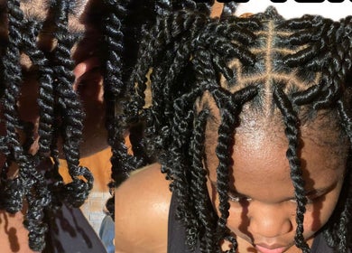 Beautiful twisted hairstyle at Platinum's Beauty Studio, Burlington, North Carolina, US.