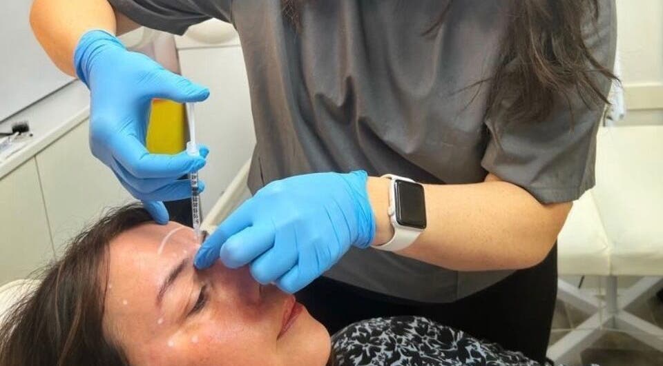 Professional treatment at 7even Trichology Clinic in London, England, GB, highlighting a detailed procedure.