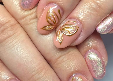 Intricate butterfly nail art with glitter polish at Meraki Beaute MBS, Stoke-on-Trent, England, GB.