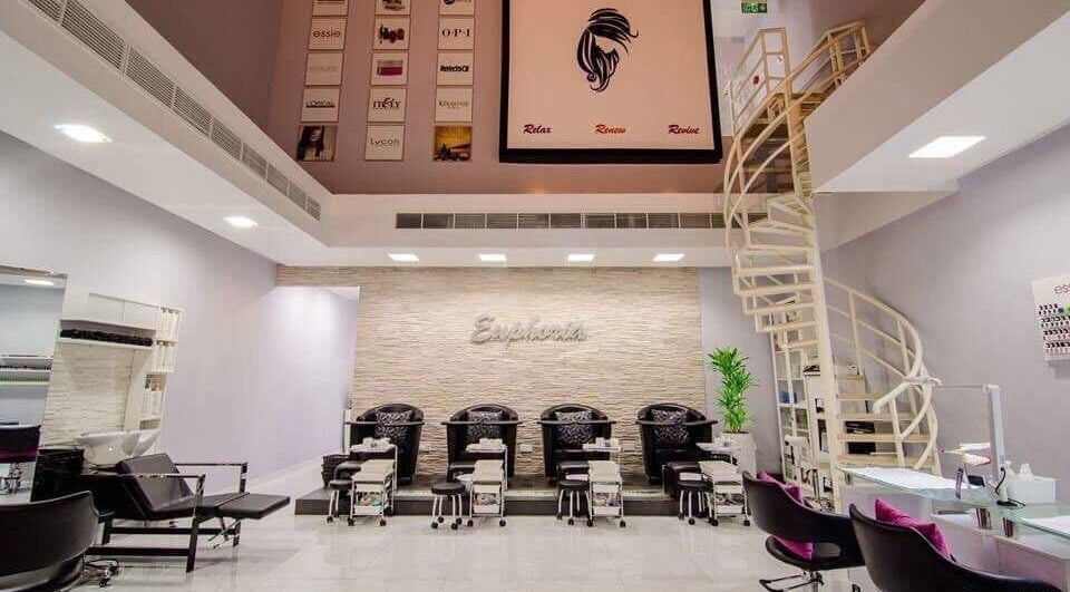 Interior view of Euphoria Ladies Beauty Saloon in دبي, دبي, AE with modern salon chairs and decor.