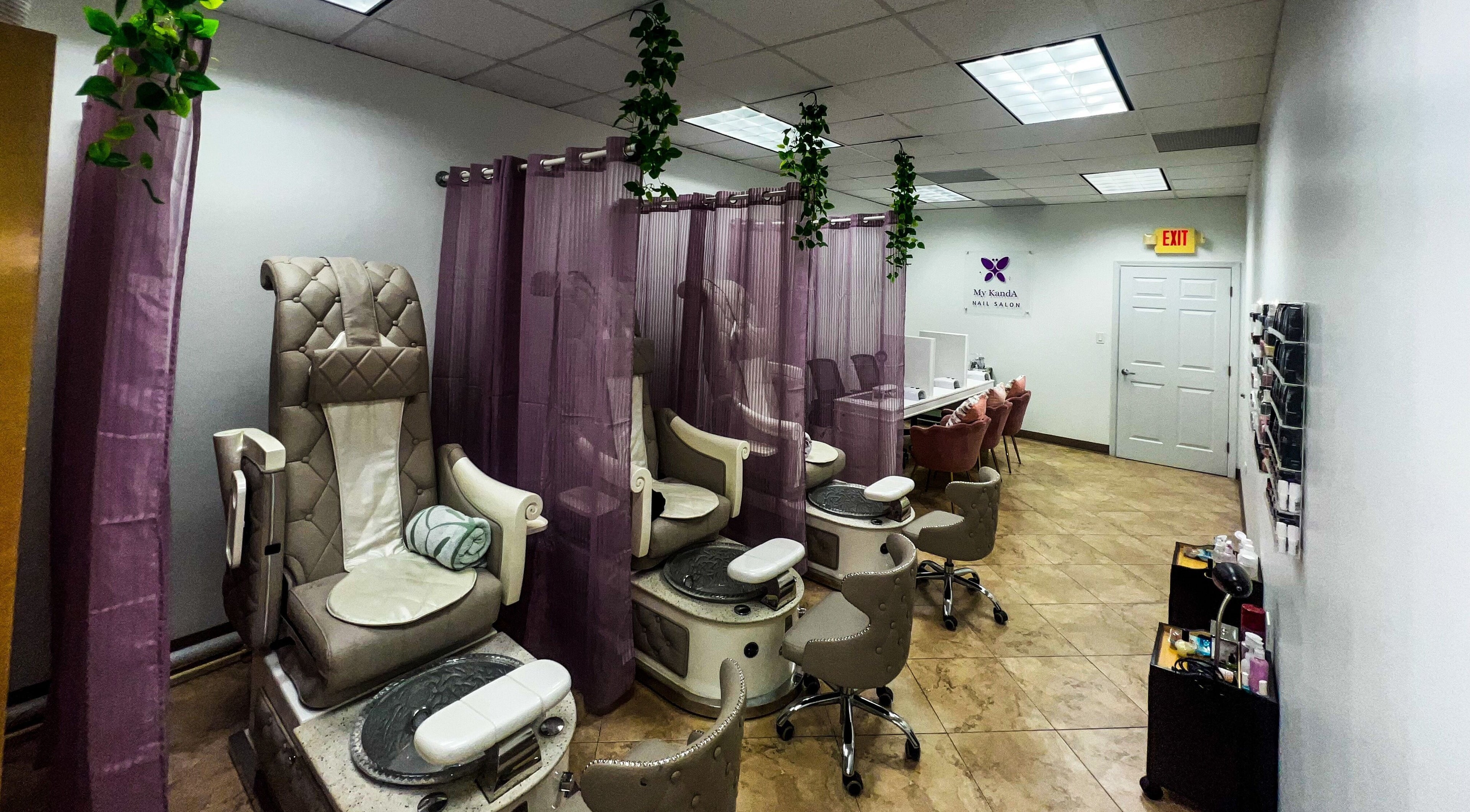 Elegant pedicure chairs at My KandA Nail Salon, Grand Cayman for a relaxing spa experience.