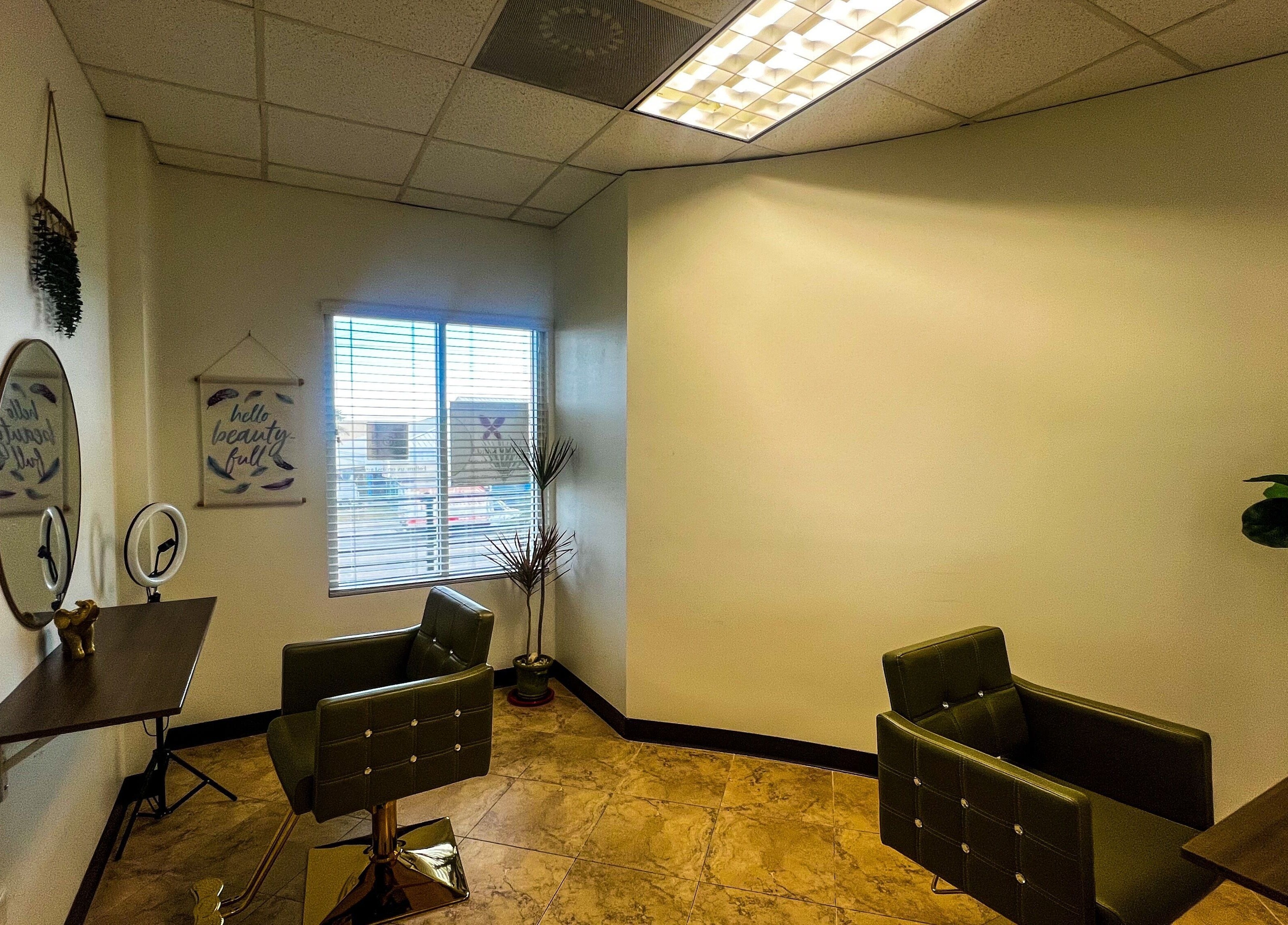 Chic interior of My KandA Nail Salon in Grand Cayman featuring stylish decor and comfortable seating.