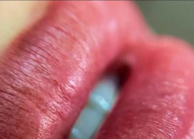 Close-up of glossy lips at La Perle Beauty Lounge, Al Khobar, Eastern Province, SA.