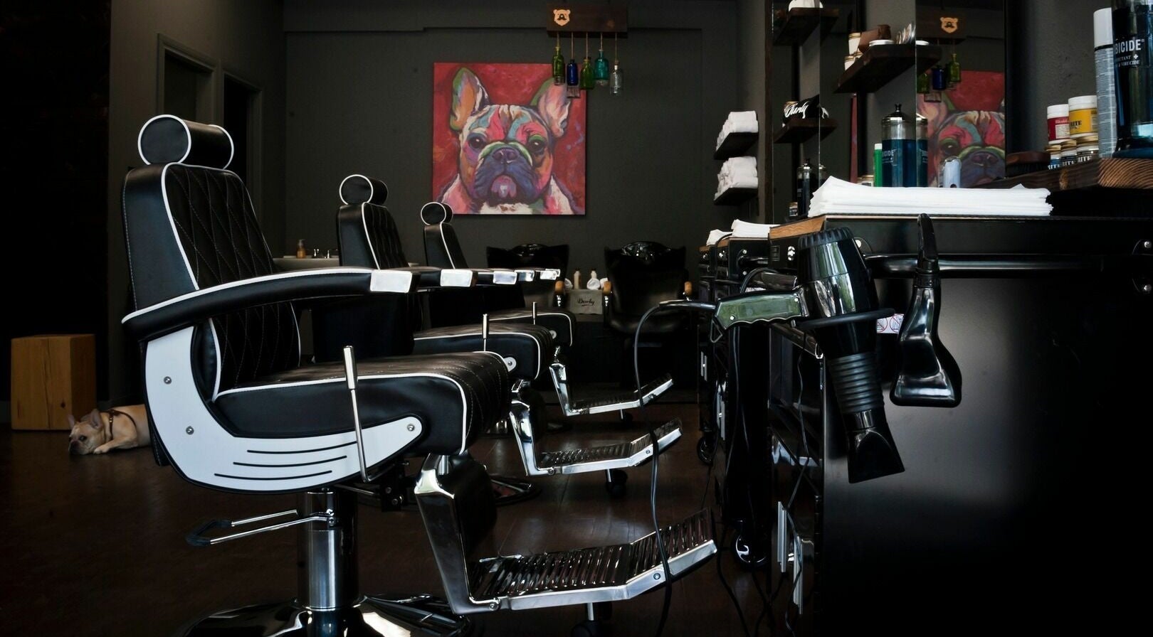 Chic barber chairs at Burly Barber, Vancouver, British Columbia, CA, ready for a haircut service.
