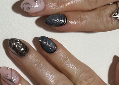 Creative nail art at Gelalicious Nails, East Victoria Park, Western Australia, AU features intricate metallic designs.