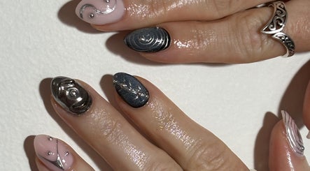 Creative nail art at Gelalicious Nails, East Victoria Park, Western Australia, AU features intricate metallic designs.