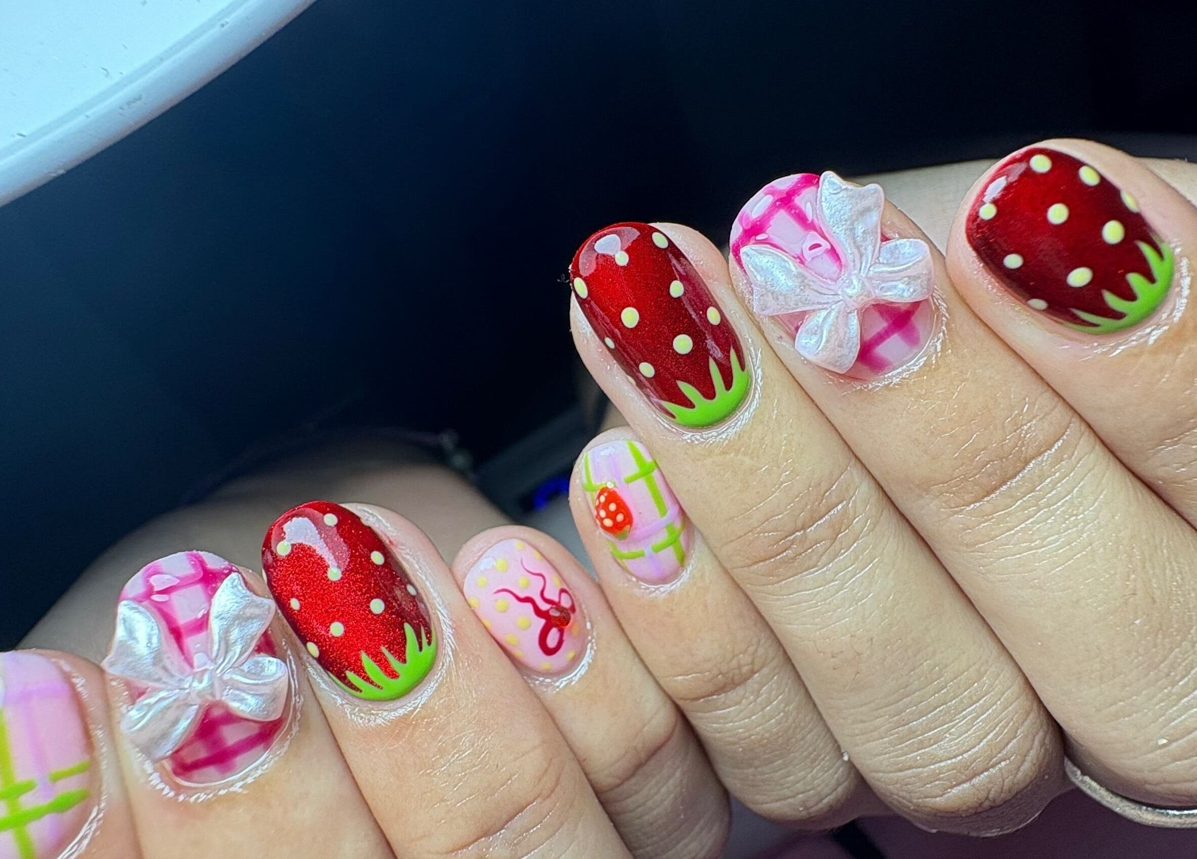 Creative strawberry-themed nail art at Gelalicious Nails, East Victoria Park, Western Australia, AU.