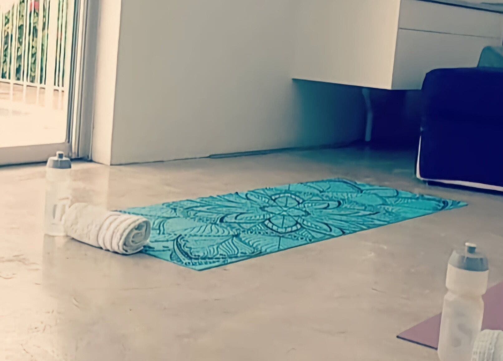 Yoga mat and towel set up at JK Personal Trainer studio, Cape Town, Western Cape, ZA, ready for a session.