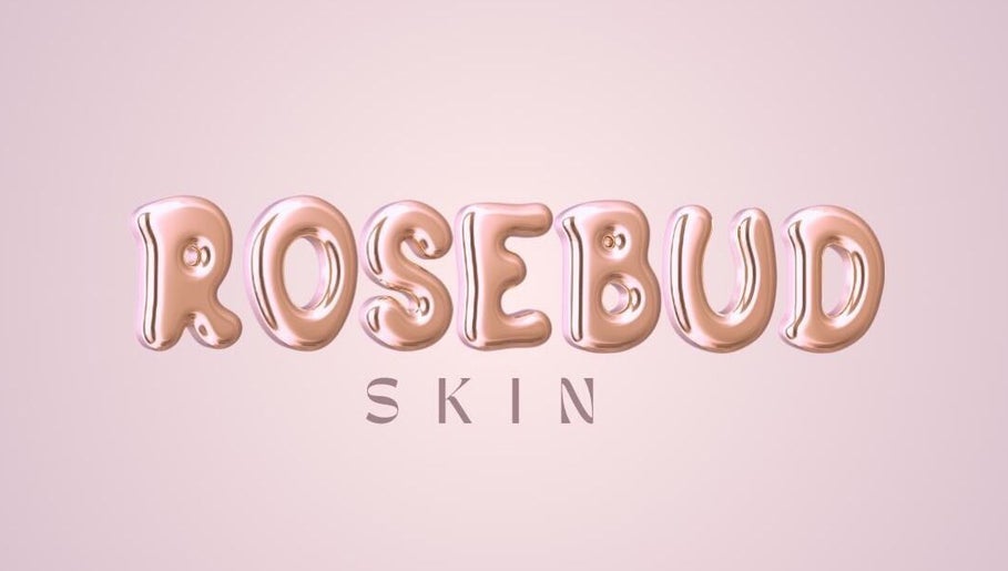 Rosebud Skin logo in glossy rose gold, Portsmouth, GB, reflecting beauty and elegance.