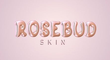 Stylized Rosebud Skin logo in metallic lettering, representing beauty haven in Portsmouth, GB.