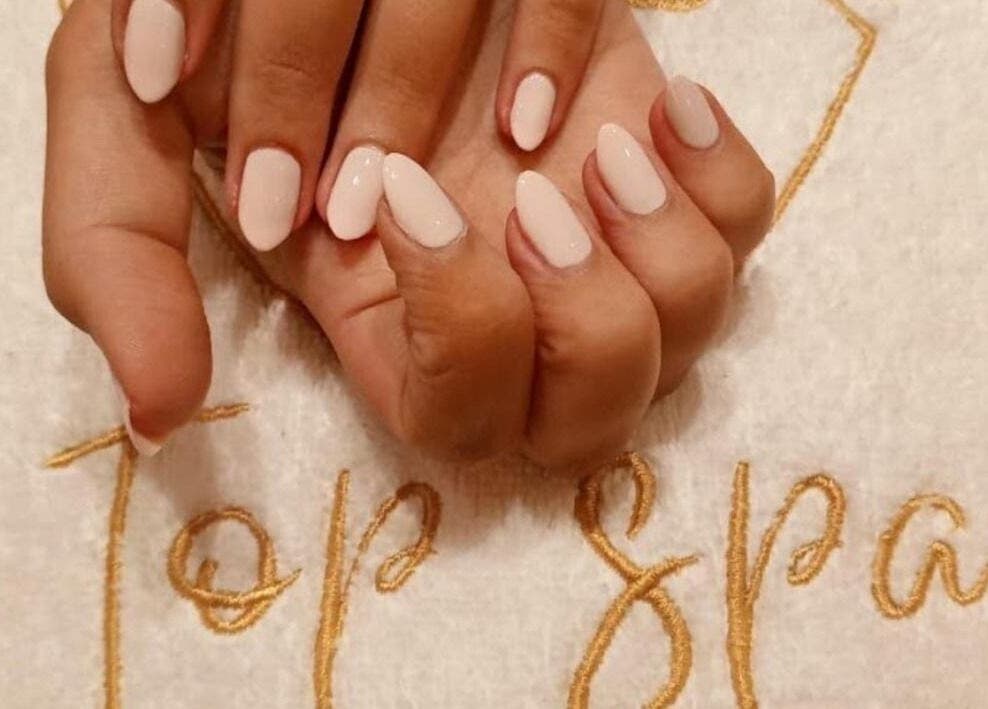 Beautifully manicured hands at Top Spa Home Services توب سبا للنساء in Riyadh, Riyadh Province, SA.
