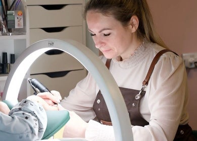 Nail artist at Clover Beauty Studio Limited in Ennis, County Clare, IE providing manicure services.