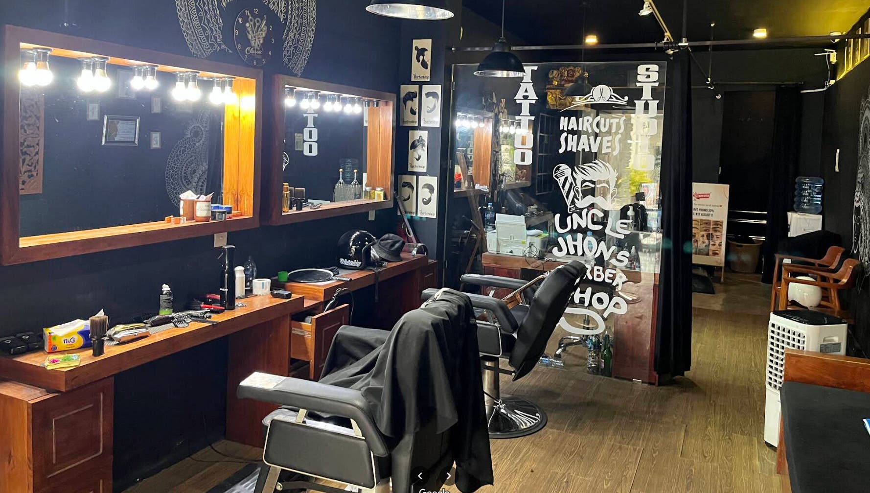 Modern interior of Uncle Jhon's Barber, Tattoo, Piercing, Lashes in Bali, Bali, ID showcasing stylistic appeal.