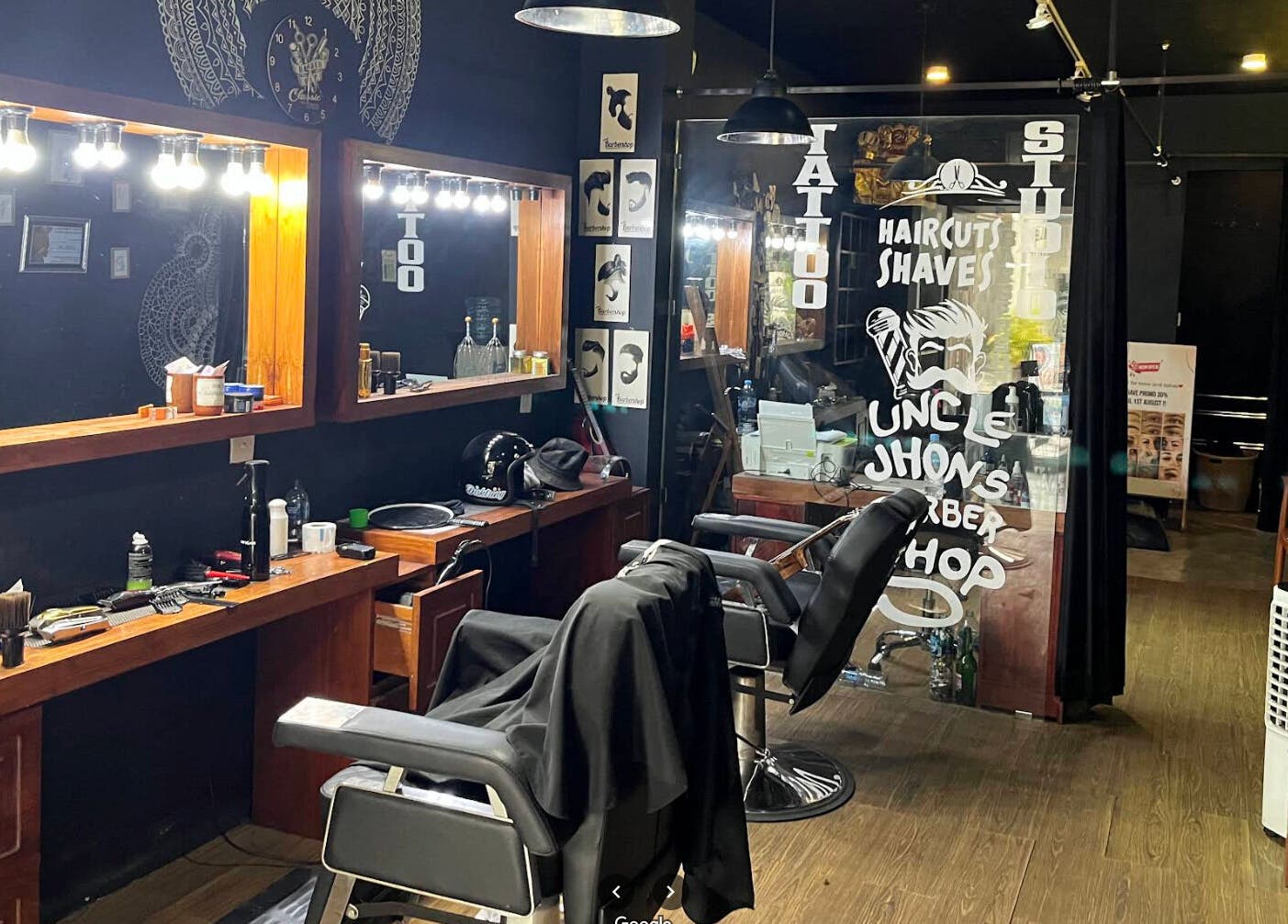 Modern interior of Uncle Jhon's Barber, Tattoo, Piercing, Lashes in Bali, Bali, ID showcasing stylistic appeal.