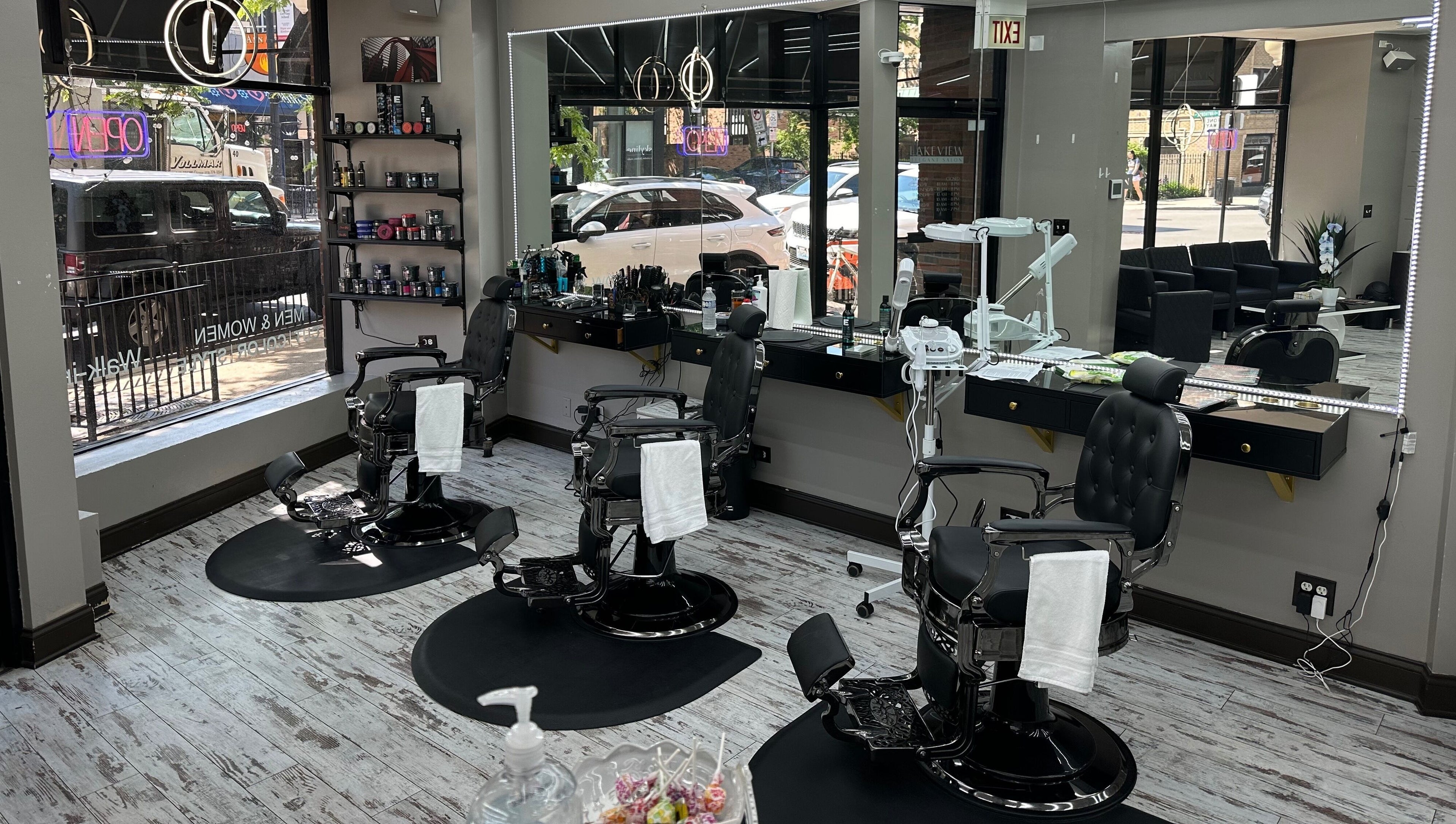 Sophisticated interior of Lakeview Elegant Salon in Chicago, Illinois, US with modern styling chairs and decor.