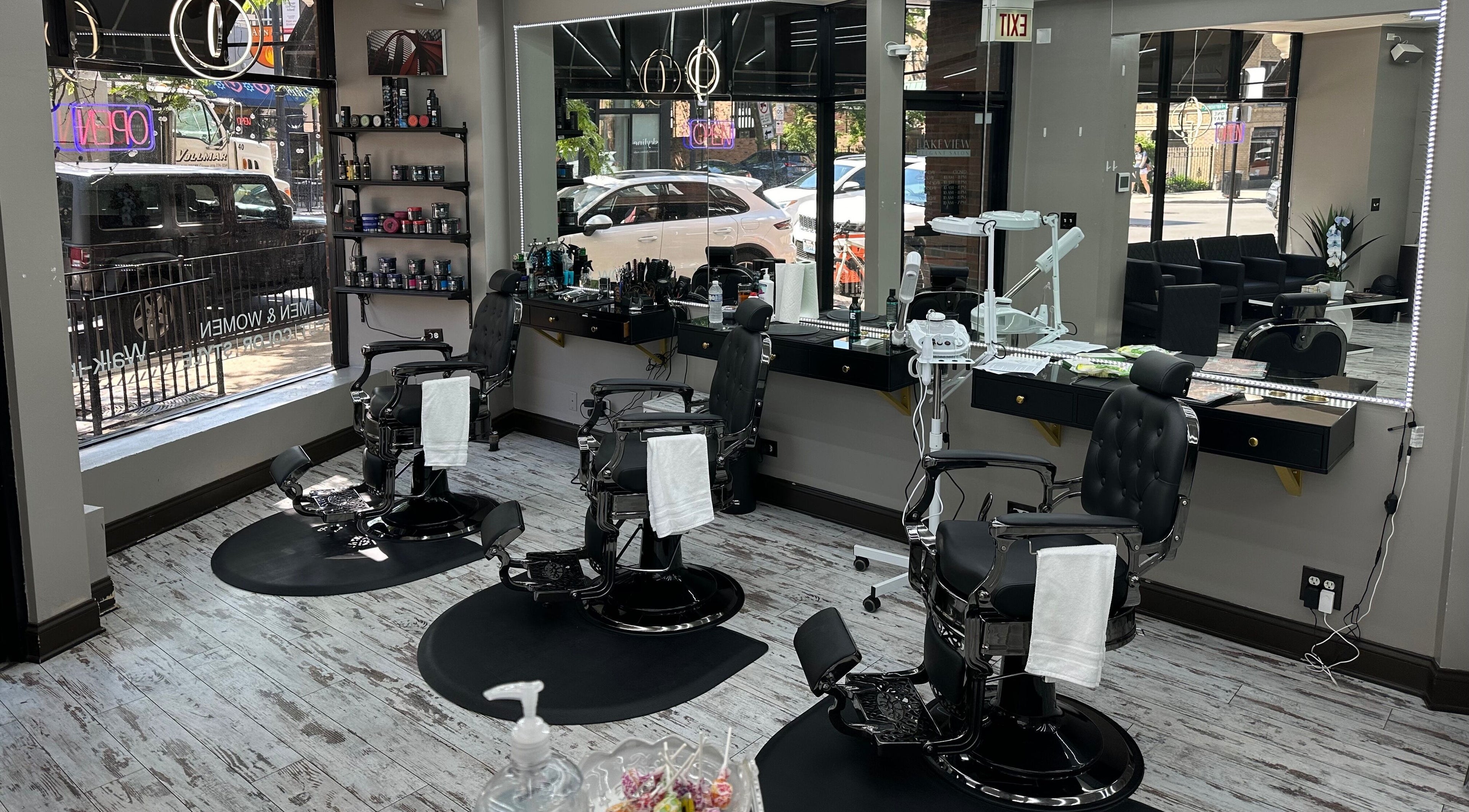 Sophisticated interior of Lakeview Elegant Salon in Chicago, Illinois, US with modern styling chairs and decor.