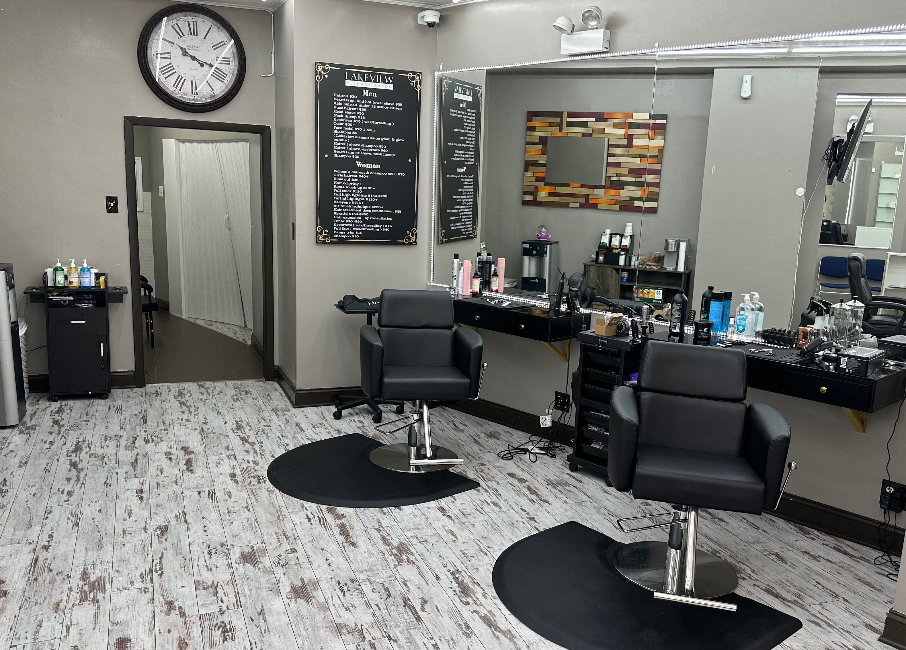 Modern chic interior of Lakeview Elegant Salon in Chicago, Illinois, US with stylish salon chairs and decor.