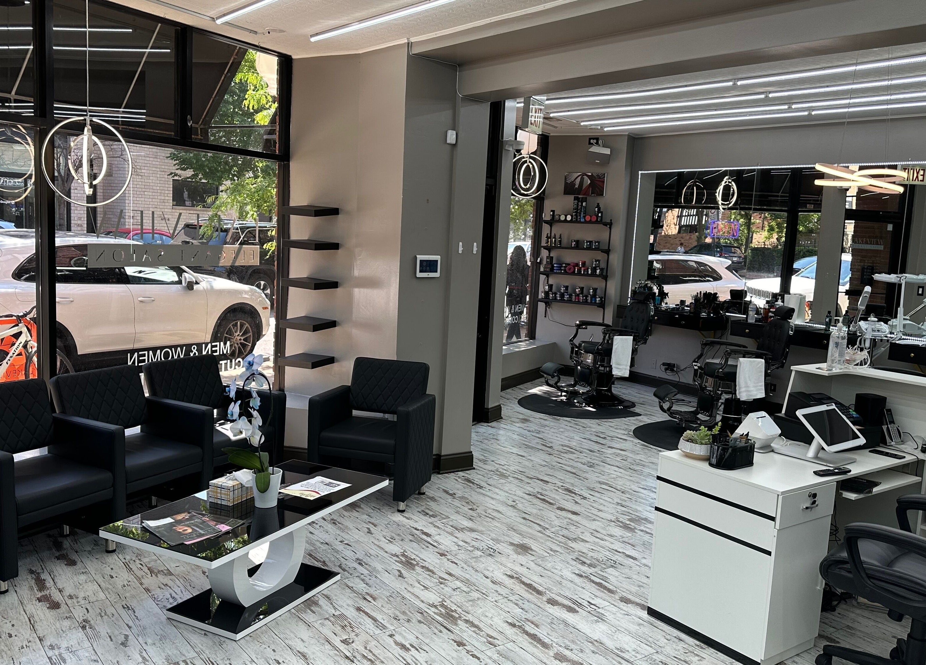 Interior of Lakeview Elegant Salon in Chicago, Illinois, featuring modern chairs and styling stations.
