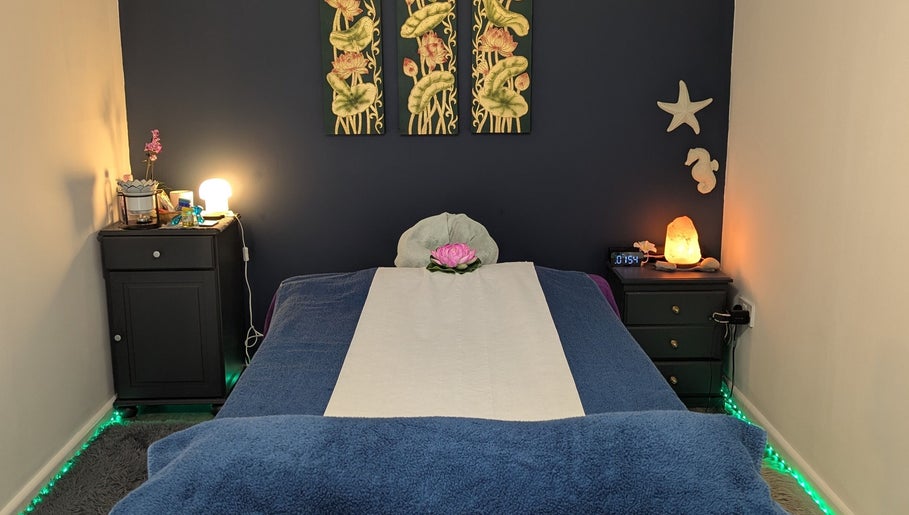 Relaxing massage room at AK Thai Solution Massage, Dudley, England, GB, features calming decor and soft lighting.