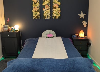 Relaxing massage room at AK Thai Solution Massage, Dudley, England, GB, features calming decor and soft lighting.