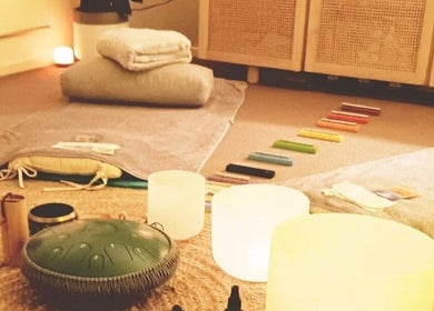Relaxing therapy space at Michaela's Holistic Beauty in Victoria, Victoria, AU with candles and cushions.