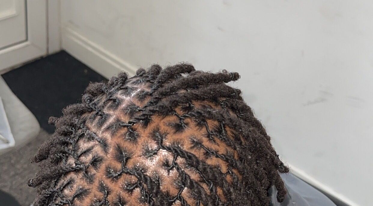 Close-up of well-crafted dreadlocks at Hairbyshile, Leicester, England, GB, showcasing professional styling.