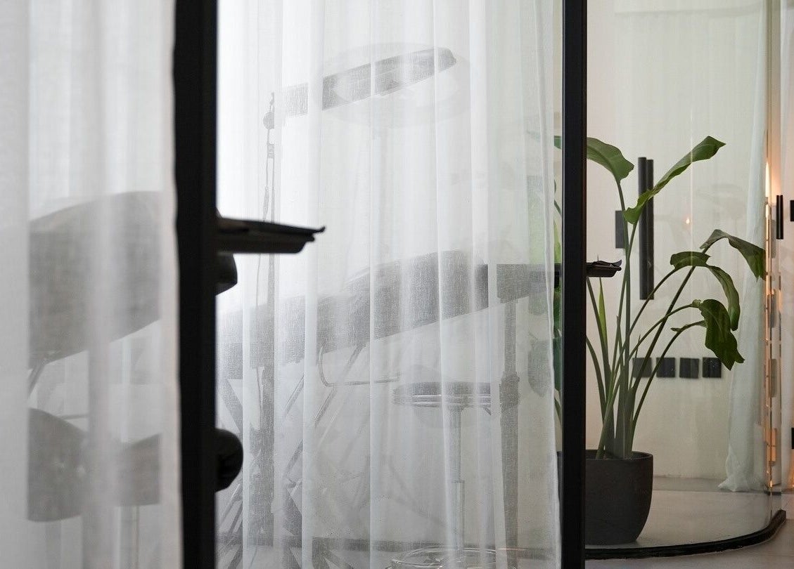 Serene interior view of Shades by Ebtihal, Al Khobar, Eastern Province, SA with elegant decor and lush greenery.