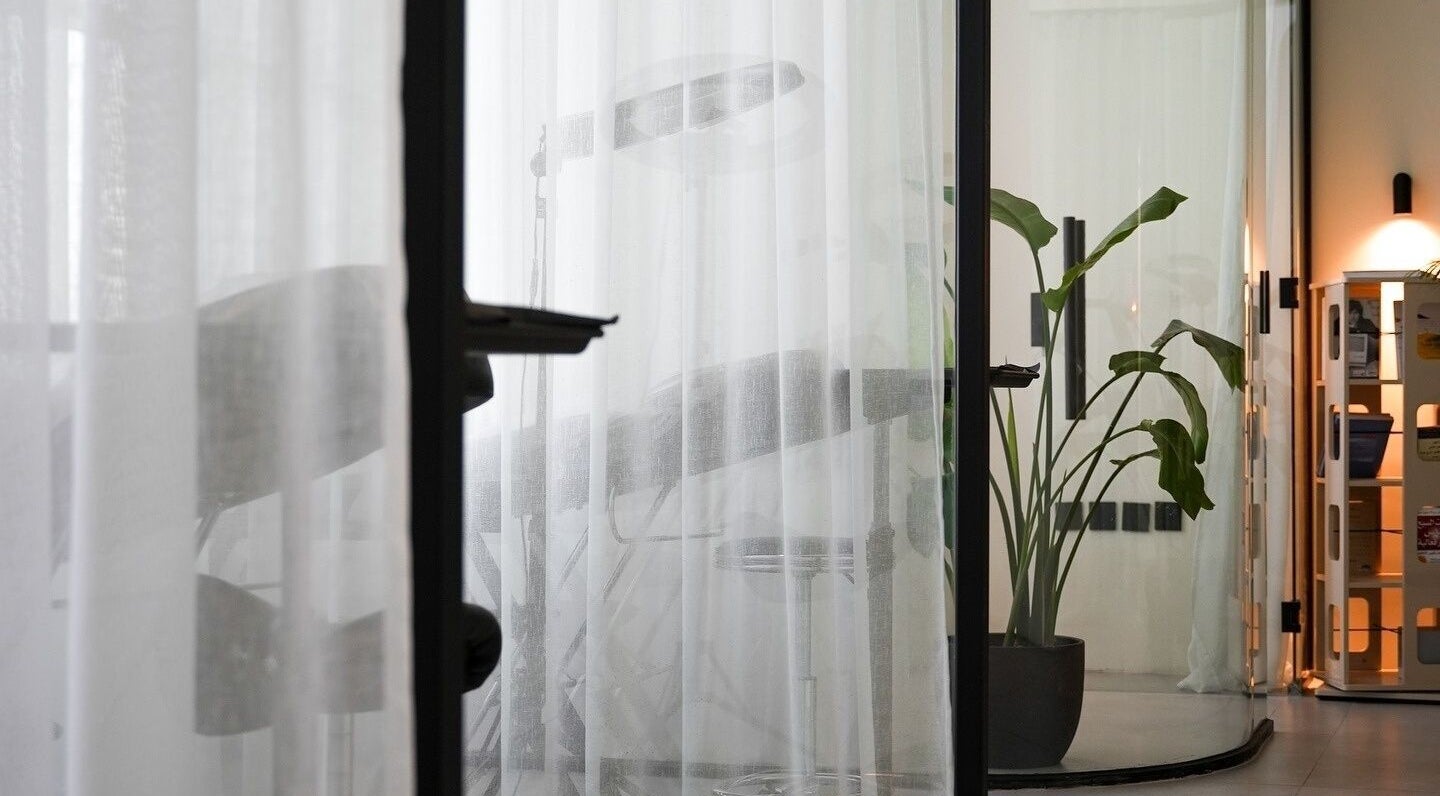 Serene interior view of Shades by Ebtihal, Al Khobar, Eastern Province, SA with elegant decor and lush greenery.