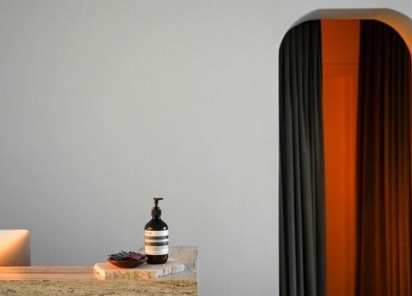 Reception area at Shades by Ebtihal, Al Khobar, Eastern Province, SA, with sleek design and warm lighting.