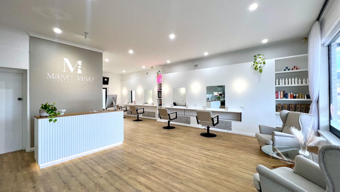 Chic interior of Mane Jane Salon Suite in Ethelton, South Australia, AU with modern chairs and mirrors.