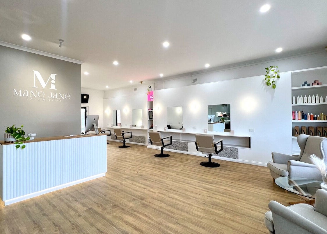 Chic interior of Mane Jane Salon Suite in Ethelton, South Australia, AU with modern chairs and mirrors.