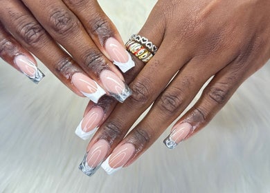Elegant acrylic nails at Zuriah Nails & Cosmetics, Oistins, Christ Church, BB, showcasing stylish nail art.
