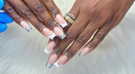 Elegant acrylic nails at Zuriah Nails & Cosmetics, Oistins, Christ Church, BB, showcasing stylish nail art.