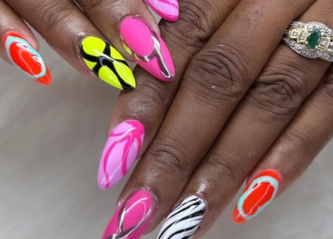 Colorful nail designs showcased at Zuriah Nails & Cosmetics, Oistins, Christ Church, BB.