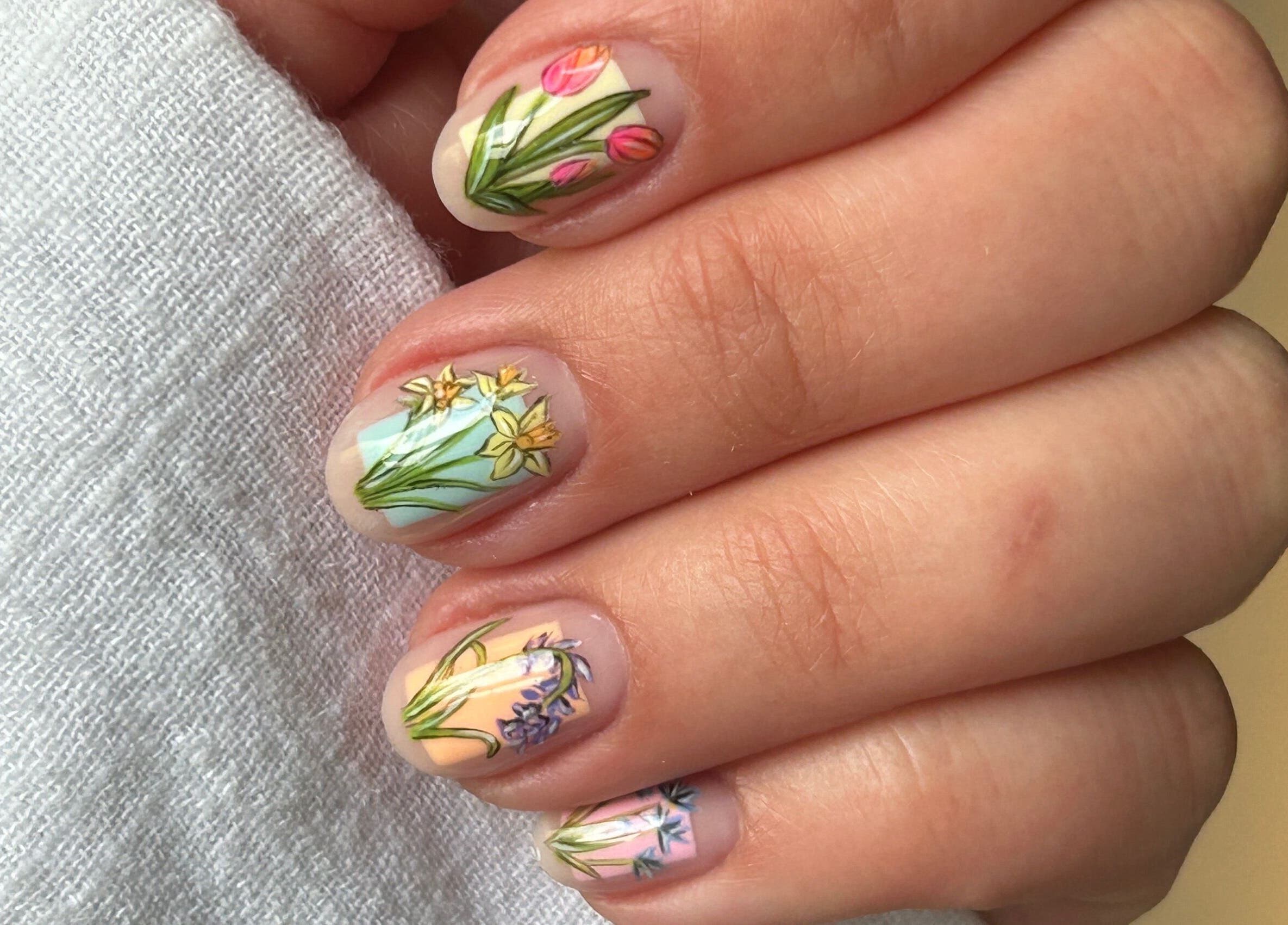 Intricate floral nail art at Phresh, Woodbridge, England, GB, showcasing vibrant spring designs.