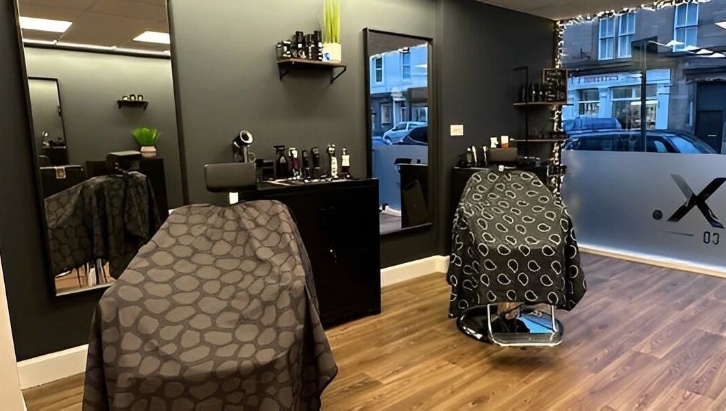 Modern interior of SLIX. Barber Co in Perth, Scotland with stylish chairs and sleek decor.