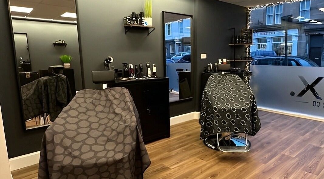 Modern interior of SLIX. Barber Co in Perth, Scotland with stylish chairs and sleek decor.