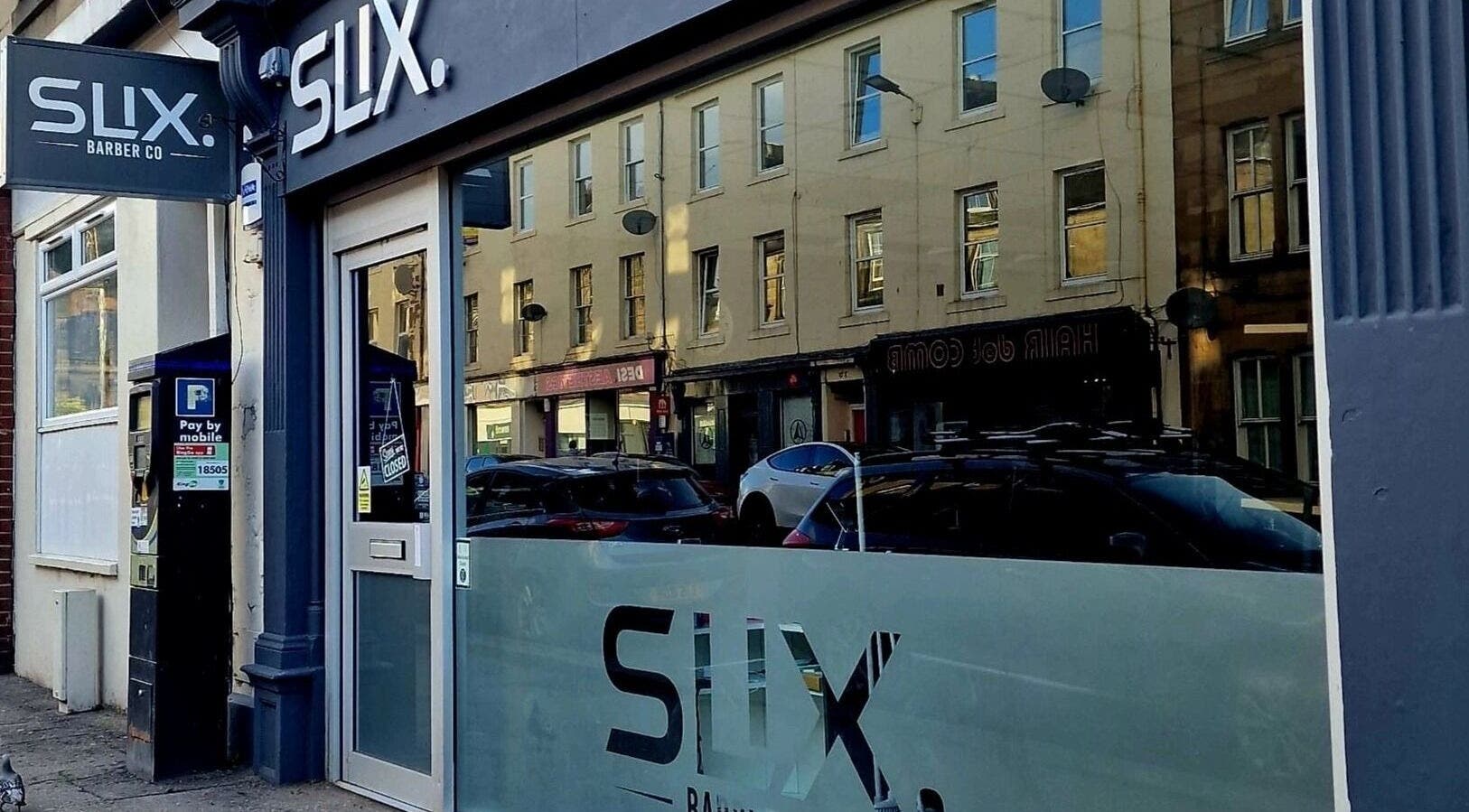 Front entrance of SLIX. Barber Co in Perth, Scotland, GB showcasing modern design and signage.