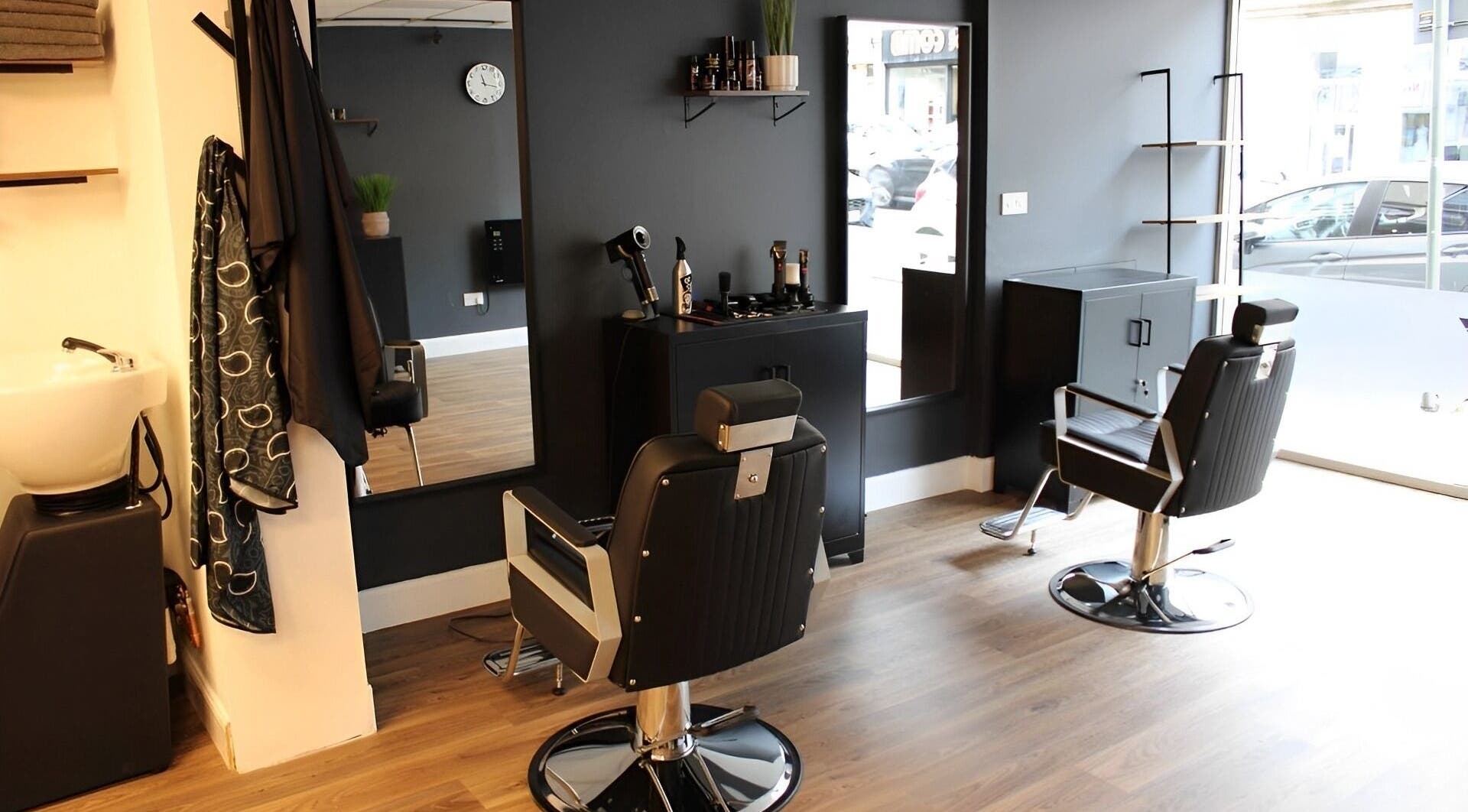 Interior of SLIX. Barber Co, Perth, Scotland, GB with sleek chairs and minimalist decor.